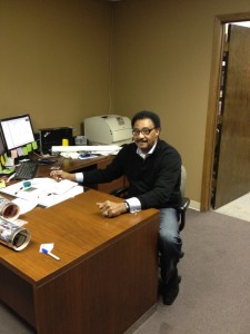 Mr. Chuck Foreman at the office  